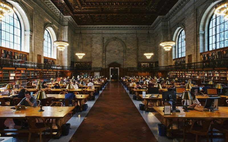 group of people inside the library — Photo by Robert Bye on Unsplash