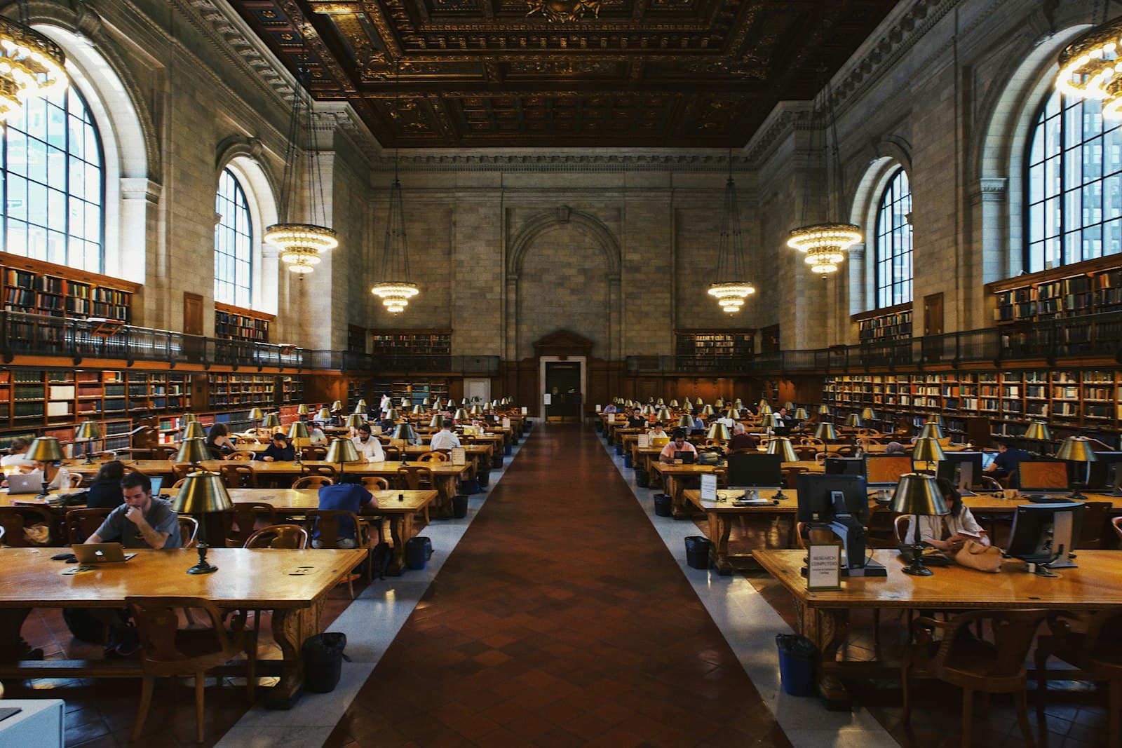 group of people inside the library — Photo by Robert Bye on Unsplash